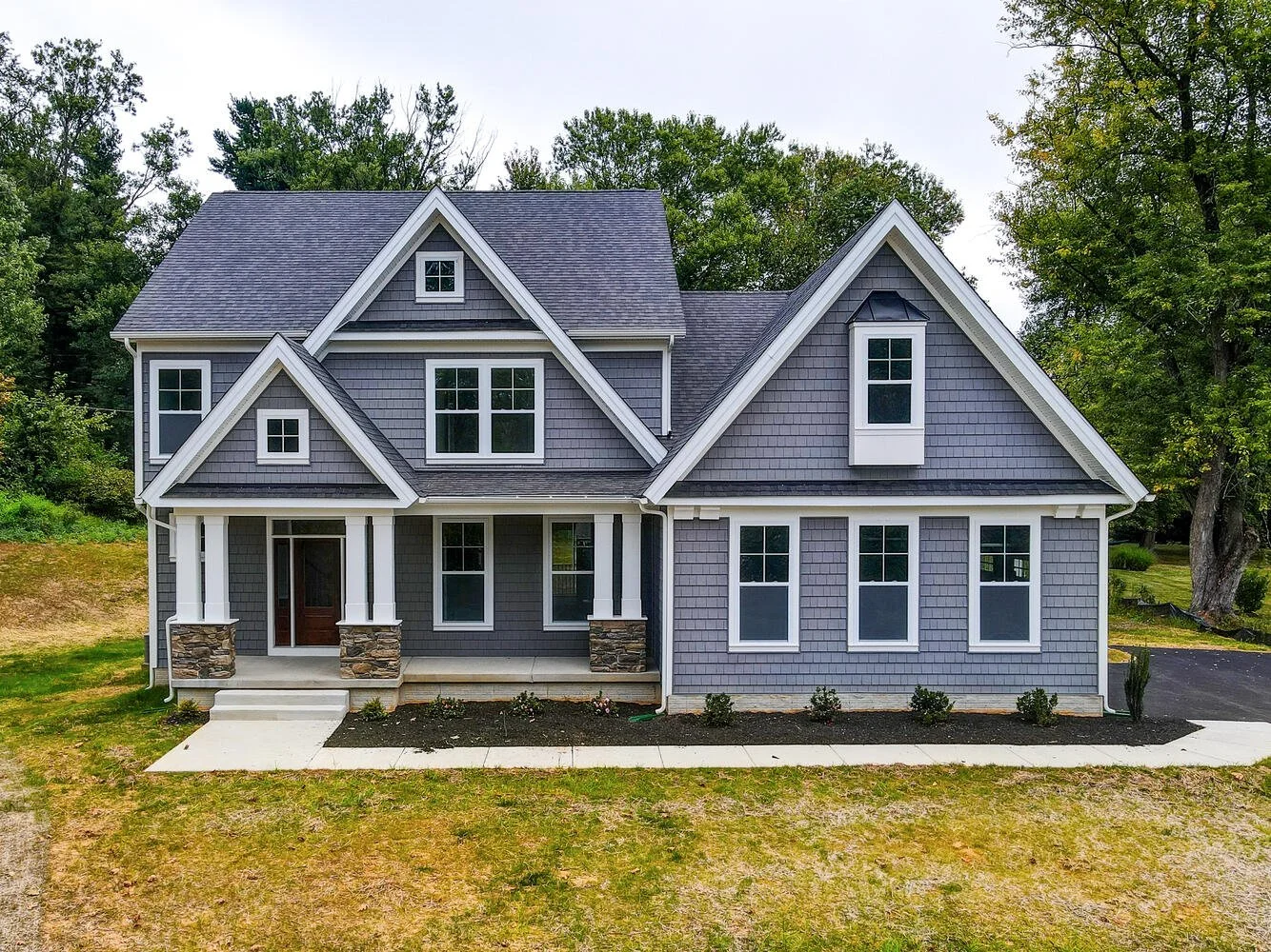 The Roosevelt Iii Craftsman model home by Greenspring Homes